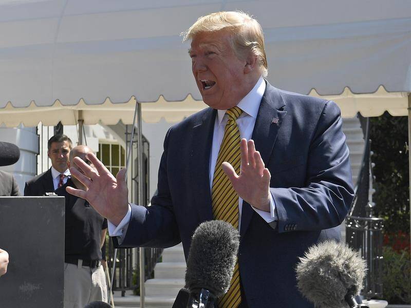 President Donald Trump says he's open to negotiations even as he warns Iran of "obliteration".