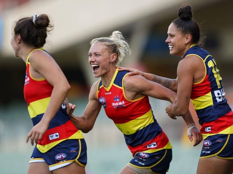 Erin Phillips (c) is delighted to have extended her stellar AFLW career with Adelaide.