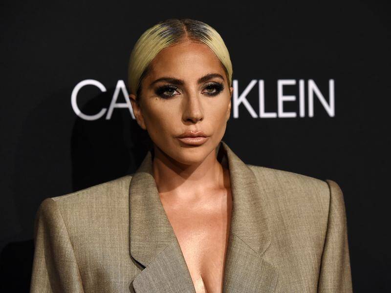 Lady Gaga is among a host of celebrities who have fled their Malibu mansions as fires burn.