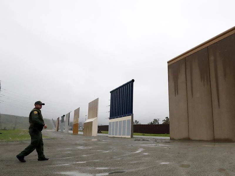 A US District Court judge has blocked funding for fencing of sections of the US-Mexico border.