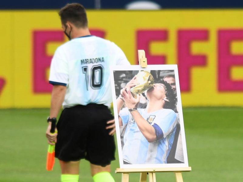 Officials (pic) and players paid tribute to the late Diego Maradona as the Argentine league resumed.