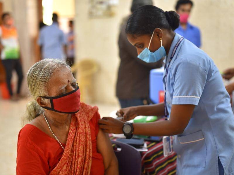 India's main challenge remains vaccinating its huge population, a top government doctor says.
