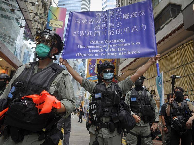 Hong Kong police display a banner warning protesters not to breach the law.