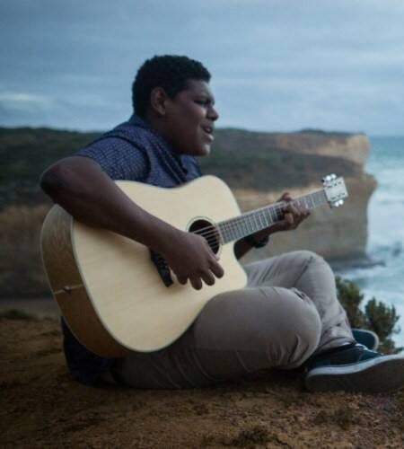 Young, strong and motivated: Self-taught guitarist Chris Tamwoy. 